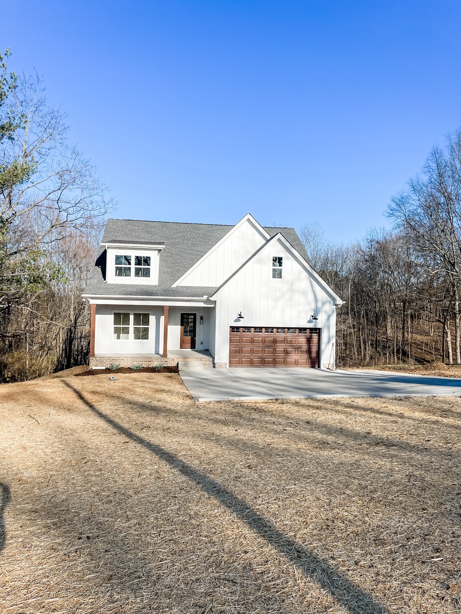 160 North Leath Road Portland, TN 37148 - Photo 3 of 31 a front view of a house with a yard