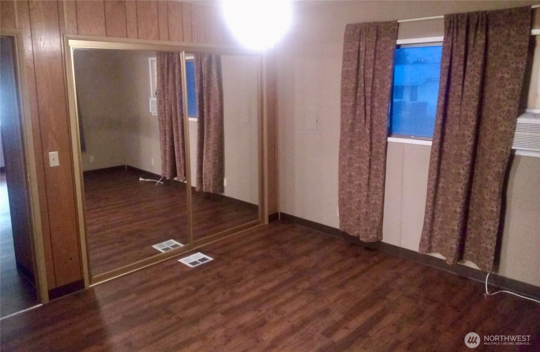 402 West 6th Avenue Ritzville, WA 99169 - Photo 12 of 19 a view of empty room with wooden floor