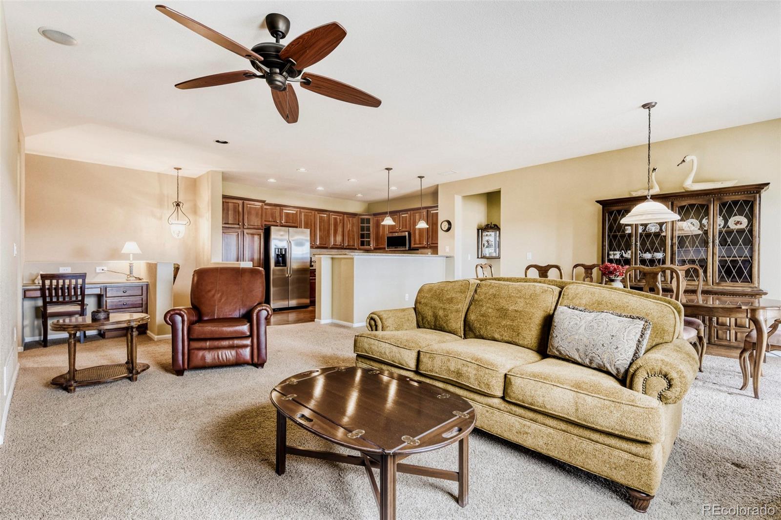 3355 Cascina Circle, Unit B Highlands Ranch, CO 80126 - Photo 6 of 28 a living room with furniture