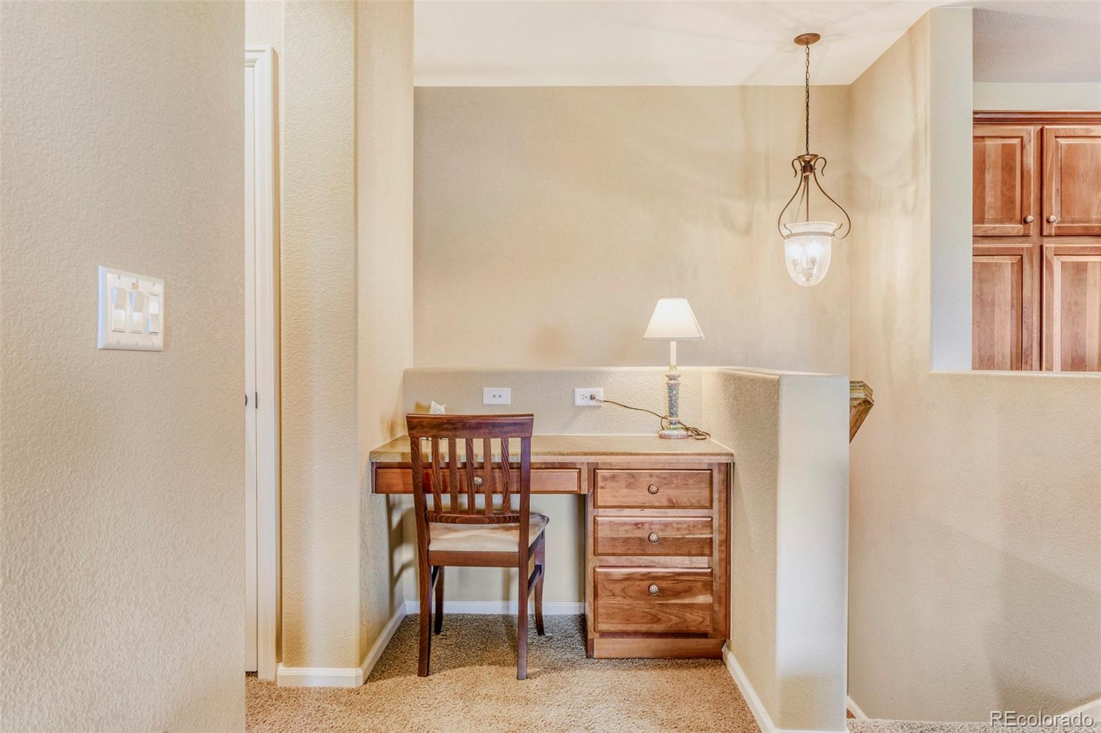 3355 Cascina Circle, Unit B Highlands Ranch, CO 80126 - Photo 10 of 28 a dining room with furniture and window
