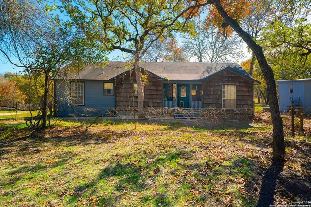 a front view of house with yard