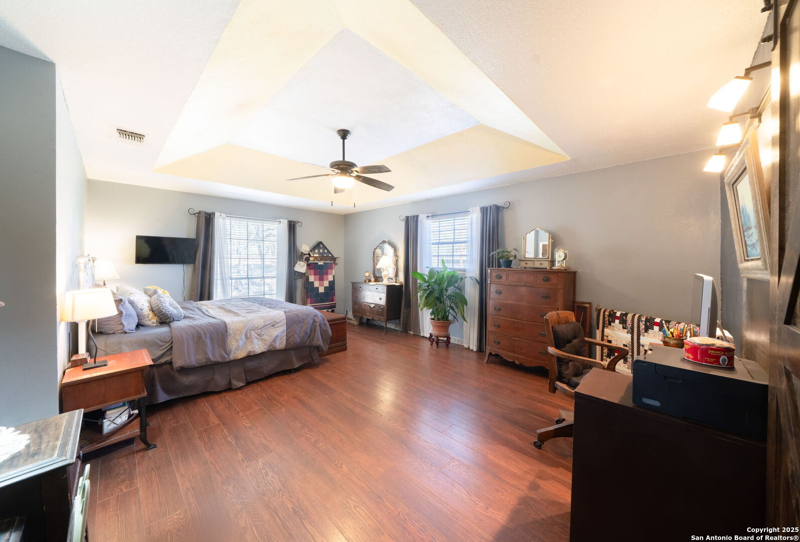 119 Post Oak Road La Vernia, TX 78121 - Photo 15 of 38 a bedroom with furniture and a wooden floor