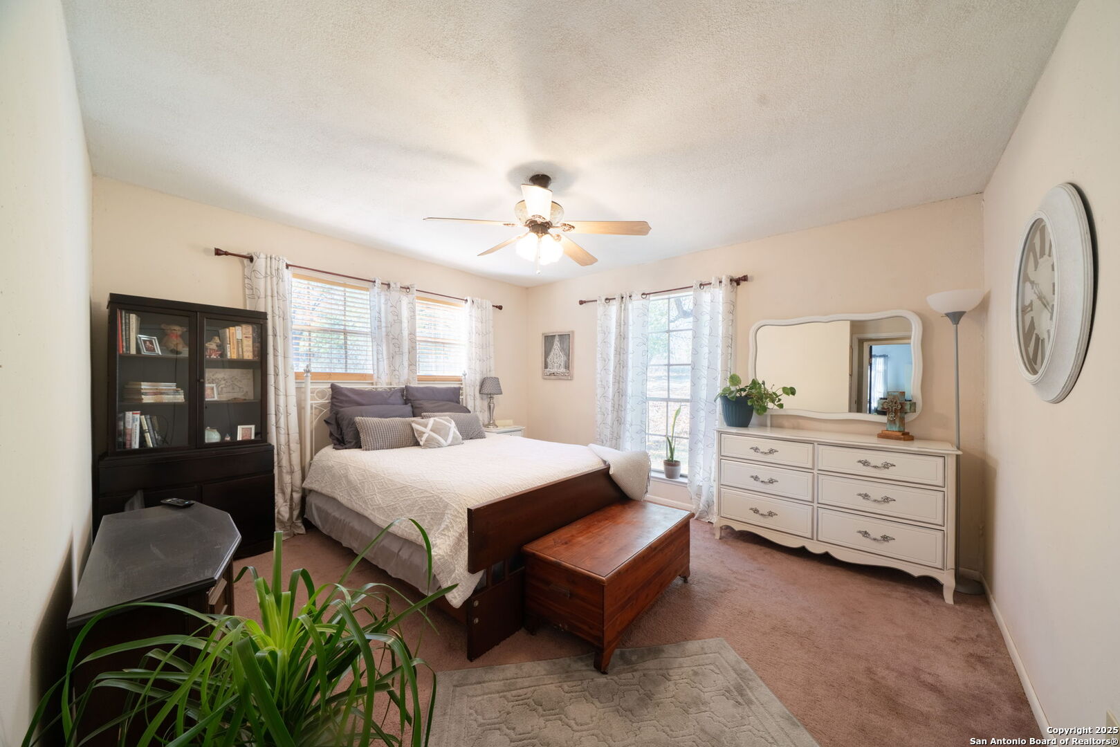 119 Post Oak Road La Vernia, TX 78121 - Photo 22 of 38 a room with a bed window and couch