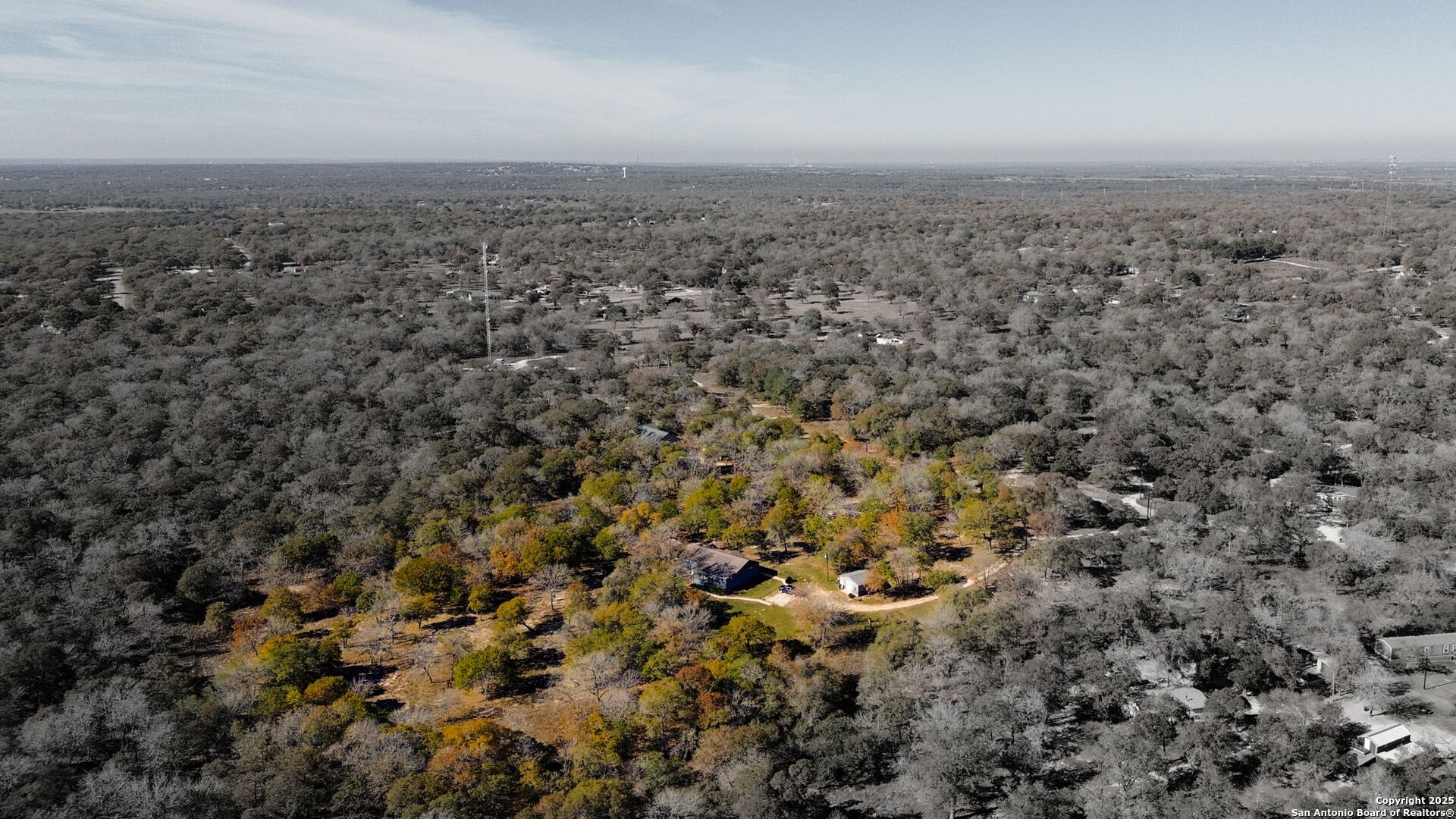 119 Post Oak Road La Vernia, TX 78121 - Photo 34 of 38 an aerial view of house with yard and mountain view in back