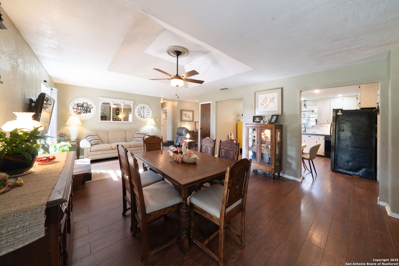 119 Post Oak Road La Vernia, TX 78121 - Photo 6 of 38 a view of a dining room with furniture and wooden floor