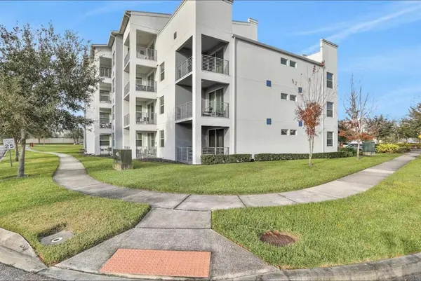 front view of a building with a yard