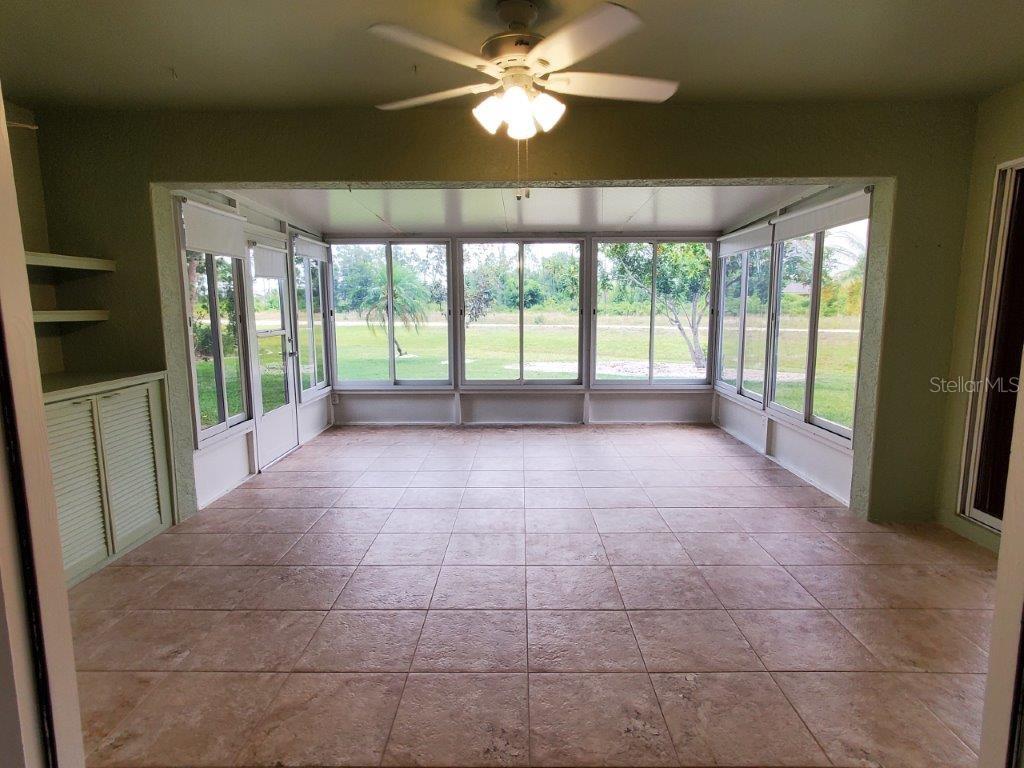26014 Ocelot Lane Punta Gorda, FL 33983 - Photo 12 of 35 a view of an empty room with a window