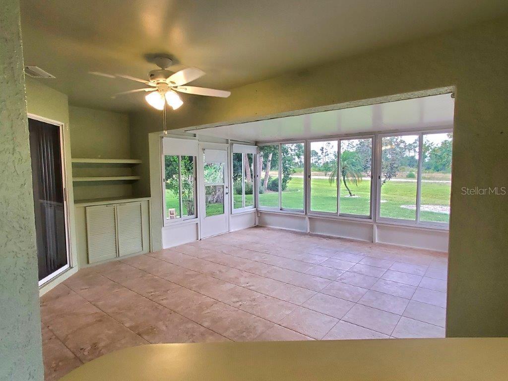 26014 Ocelot Lane Punta Gorda, FL 33983 - Photo 17 of 35 a view of an empty room with a window