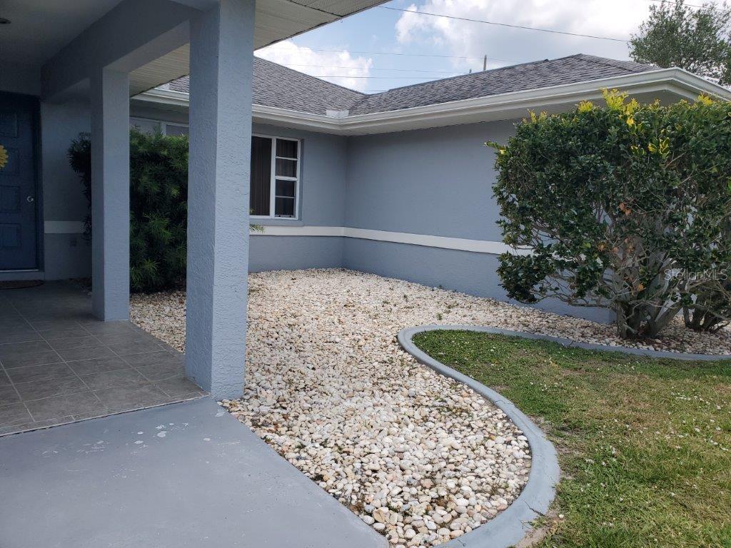 26014 Ocelot Lane Punta Gorda, FL 33983 - Photo 3 of 35 a view of a backyard of the house