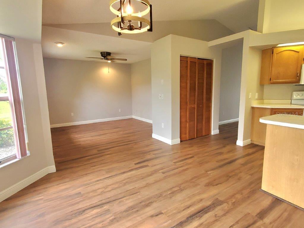 26014 Ocelot Lane Punta Gorda, FL 33983 - Photo 8 of 35 a view of a livingroom with wooden floor