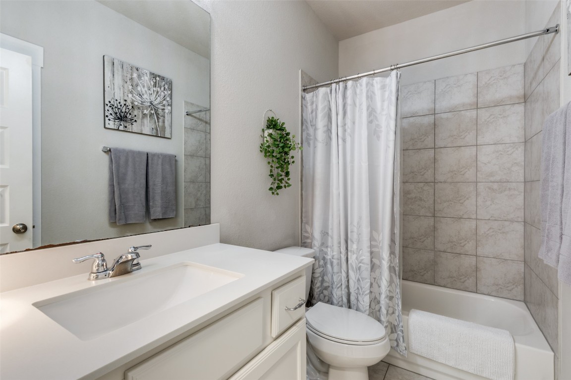 125 Syrah Court Leander, TX 78641 - Photo 17 of 25 a bathroom with a sink toilet and shower
