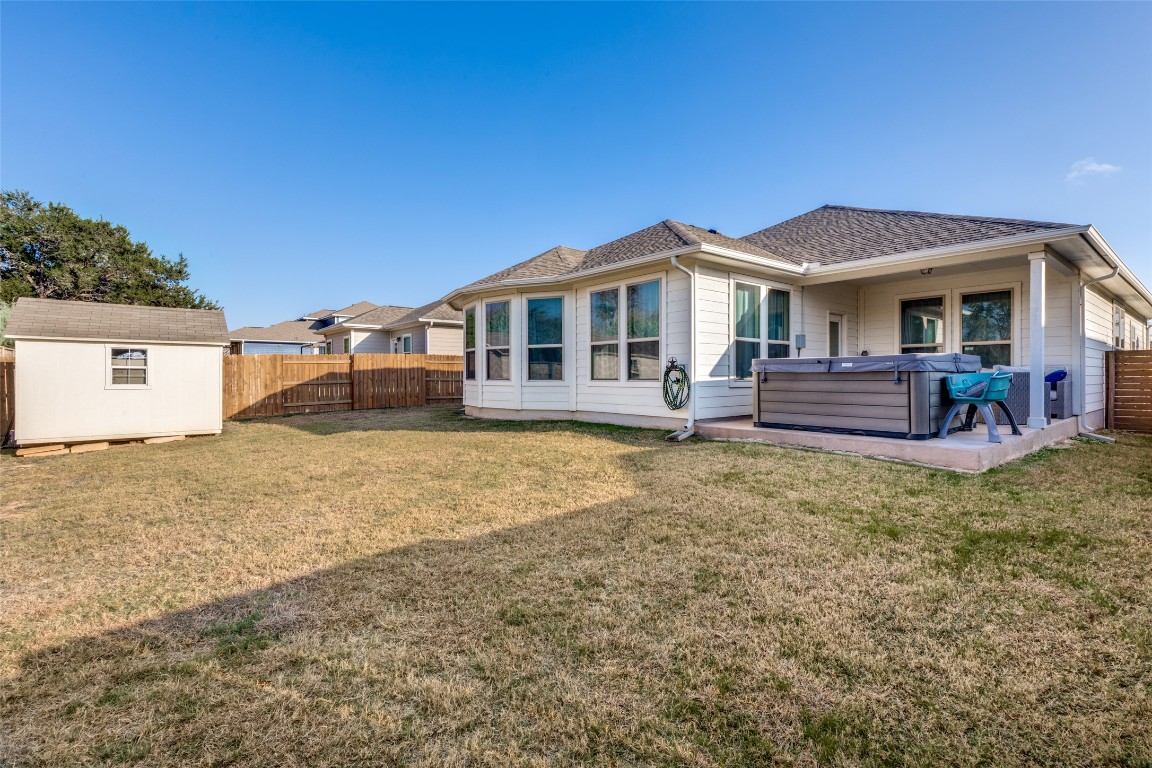 125 Syrah Court Leander, TX 78641 - Photo 23 of 25 a front view of a house with a yard