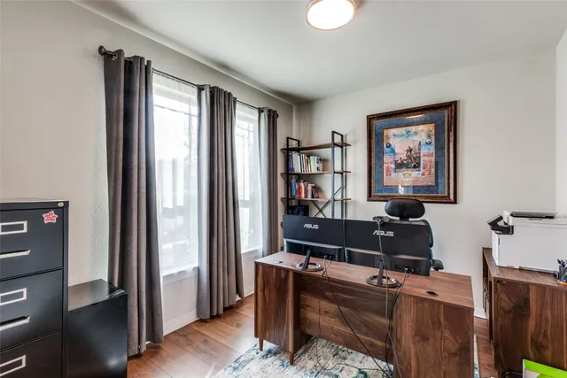 a room with furniture and a window