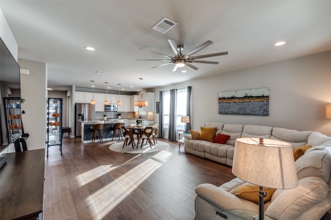 125 Syrah Court Leander, TX 78641 - Photo 8 of 25 a living room with furniture and wooden floor
