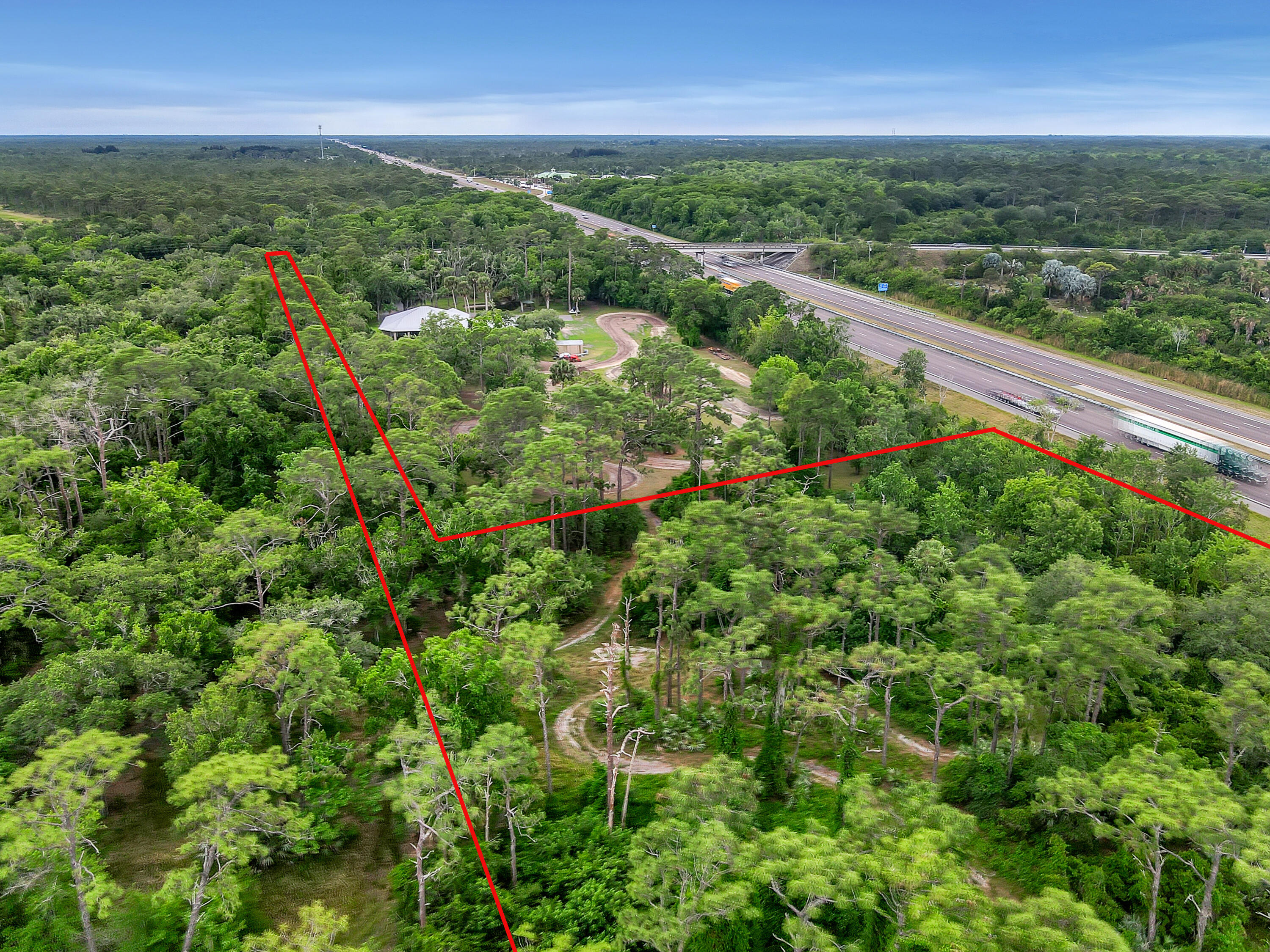 0 Valkaria Road Malabar, FL 32950 - Photo 13 of 17 an aerial view of residential houses with outdoor space and trees