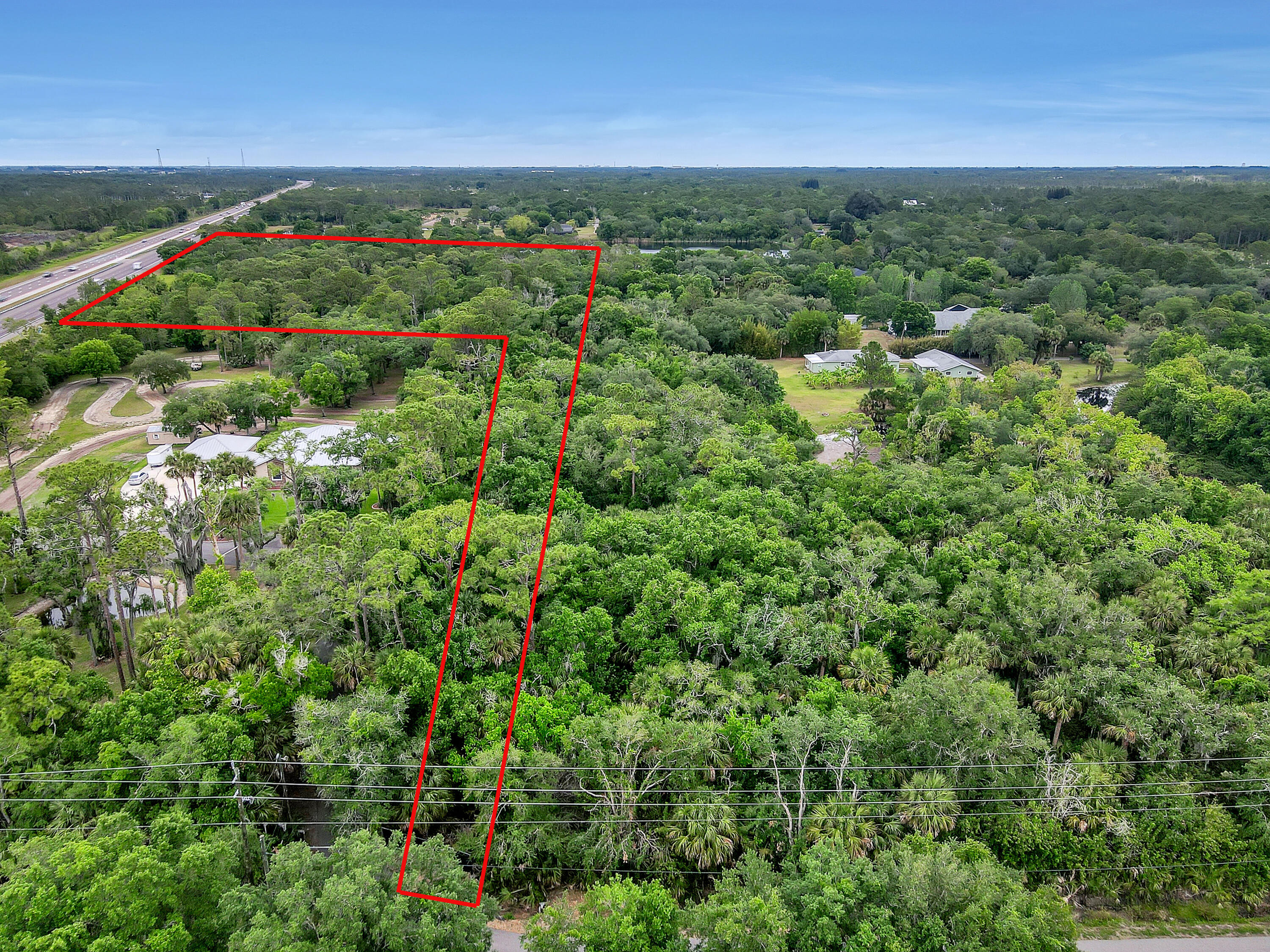 0 Valkaria Road Malabar, FL 32950 - Photo 17 of 17 an aerial view of a houses with a yard