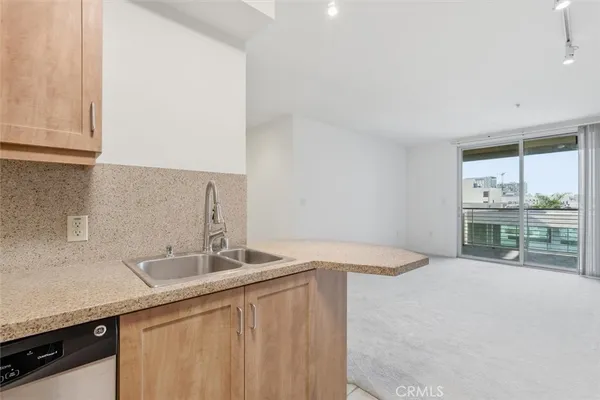 a kitchen with a sink and a cabinets
