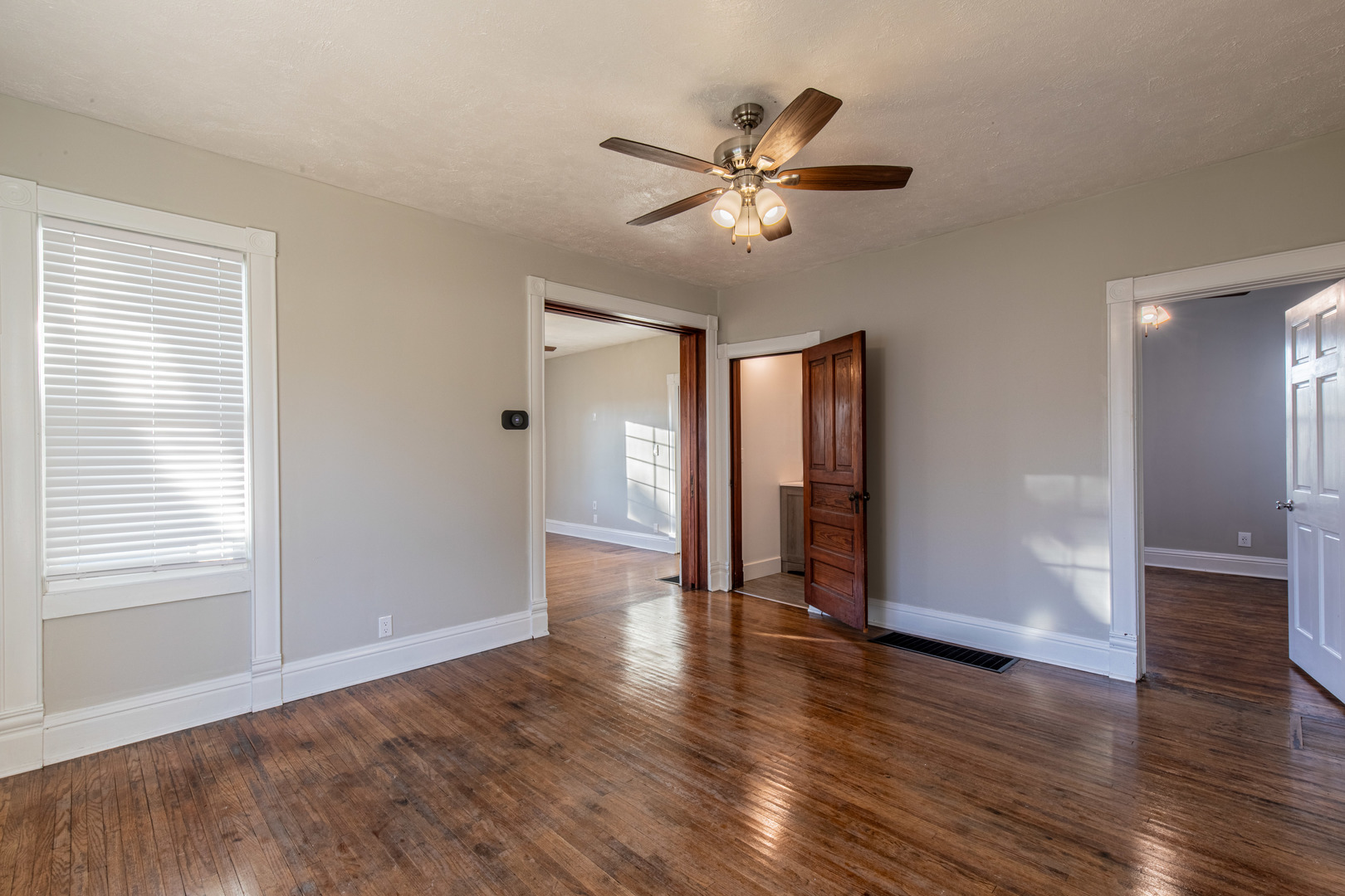 15 South Vernon Street Princeton, IL 61356 - Photo 11 of 28 a view of an empty room with wooden floor and a window