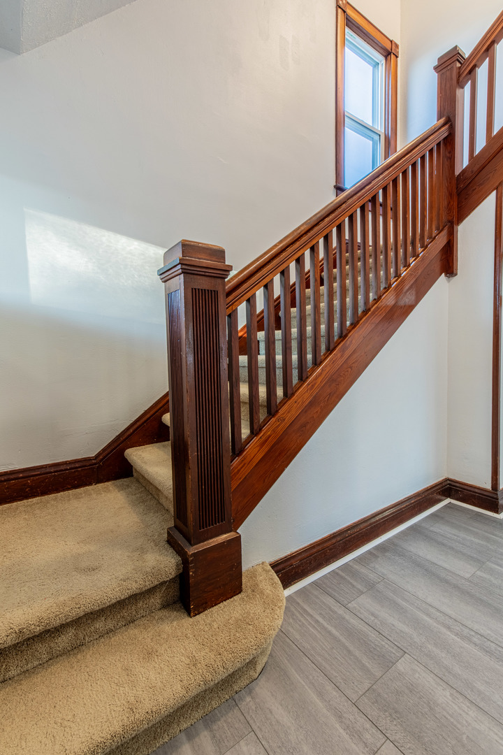 15 South Vernon Street Princeton, IL 61356 - Photo 20 of 28 a view of staircase with rug