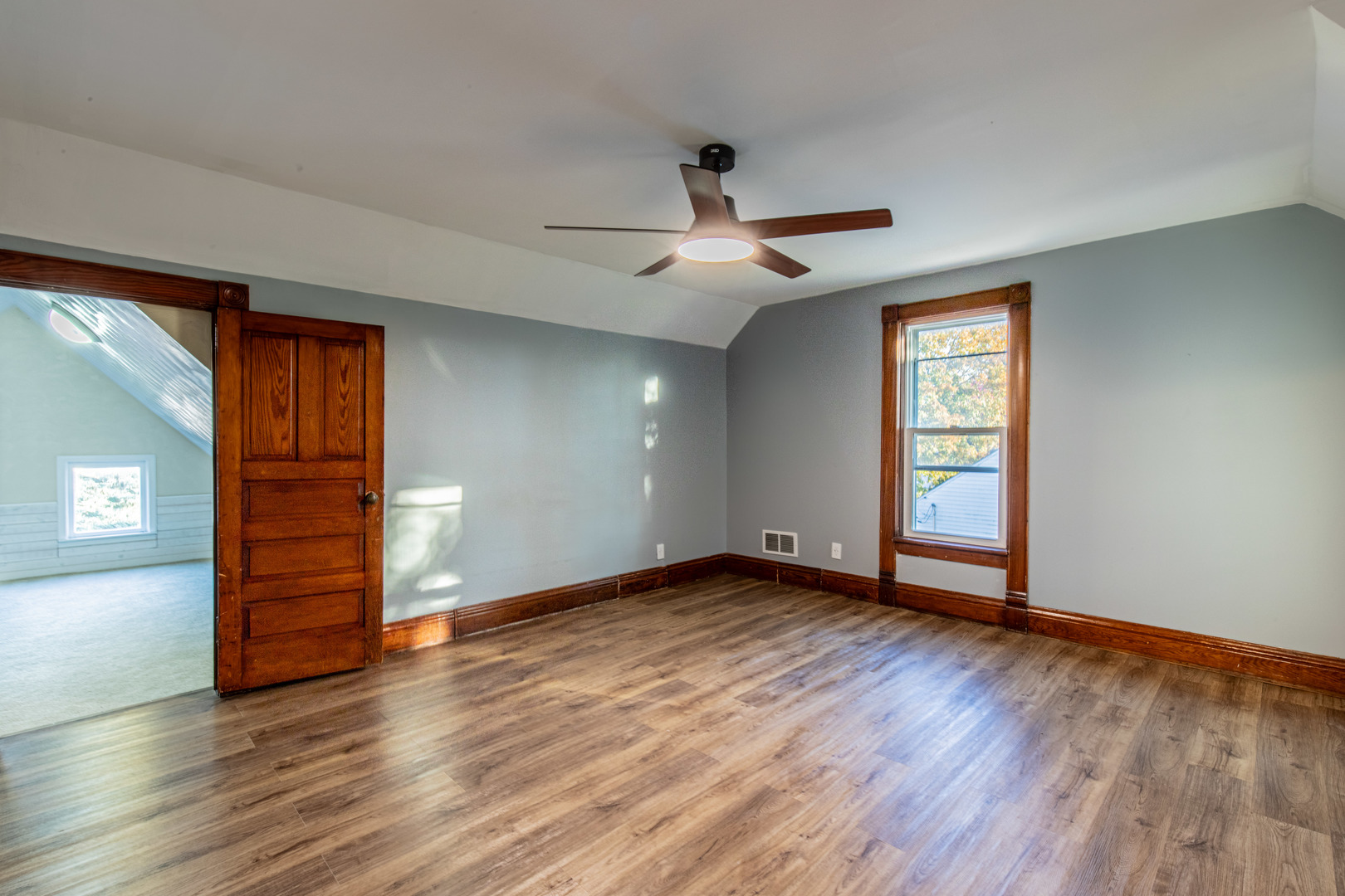 15 South Vernon Street Princeton, IL 61356 - Photo 21 of 28 an empty room with wooden floor closet and windows