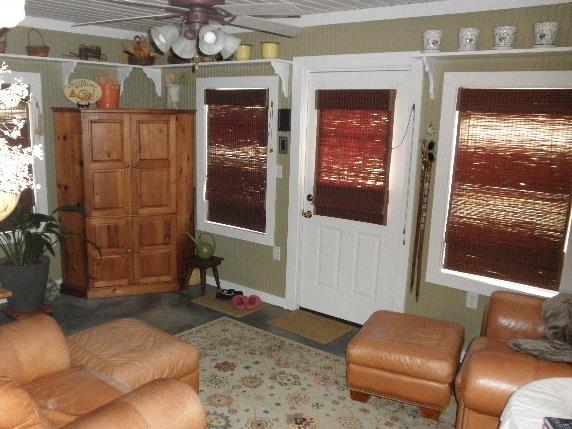 31 Lacy Road Fayetteville, TN 37334 - Photo 7 of 20 Finished porch/Florida room has concrete floors and is a great gathering place