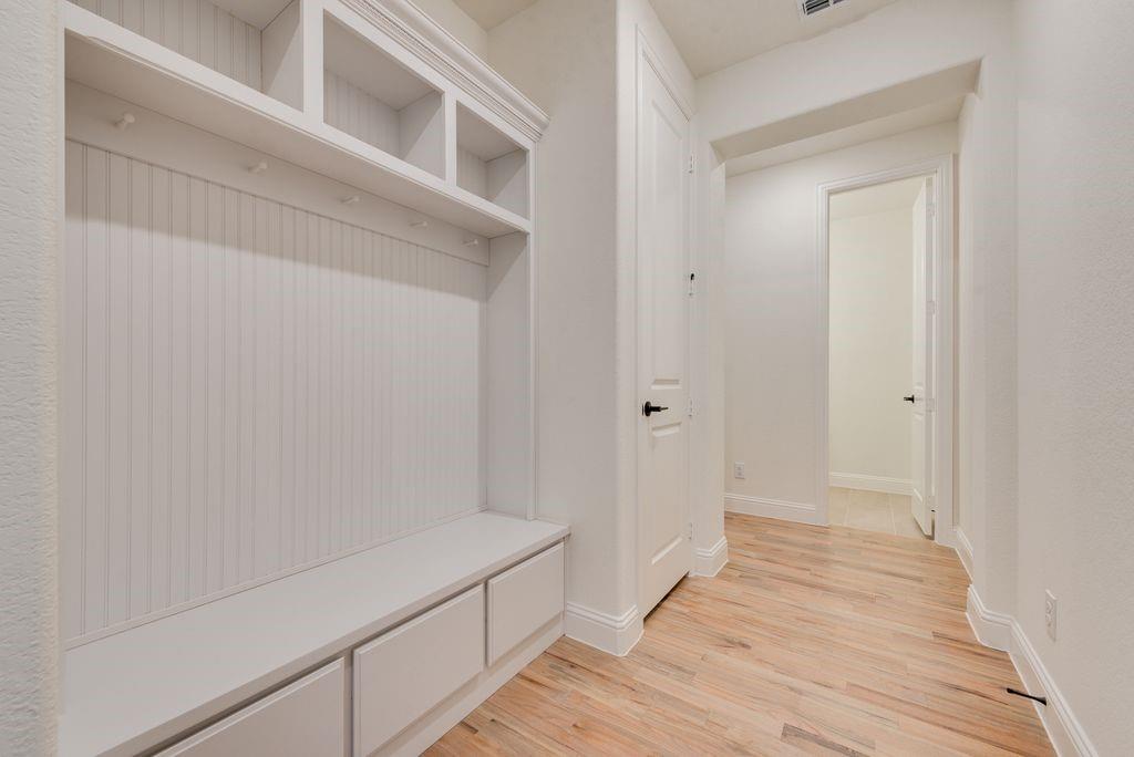 809 Turnbull Avenue Justin, TX 76247 - Photo 11 of 22 a view of hallway with wooden floor