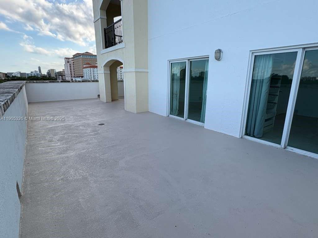 1627 Southwest 37th Avenue, Unit 207 Miami, FL 33145 - Photo 19 of 24 a view of a house with a yard