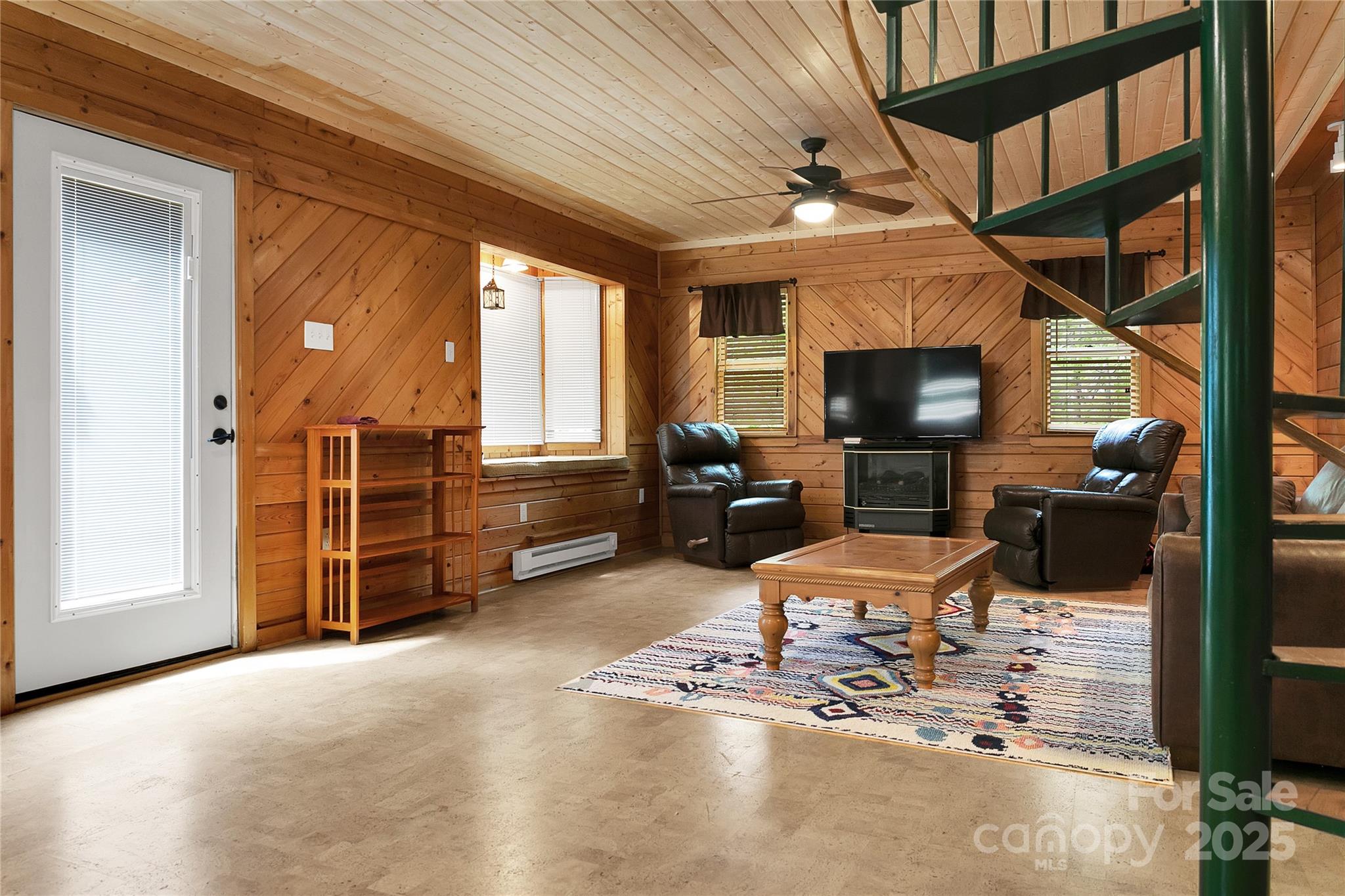 261 Franks Cove Road Brevard, NC 28712 - Photo 12 of 34 a view of a livingroom with furniture and a window