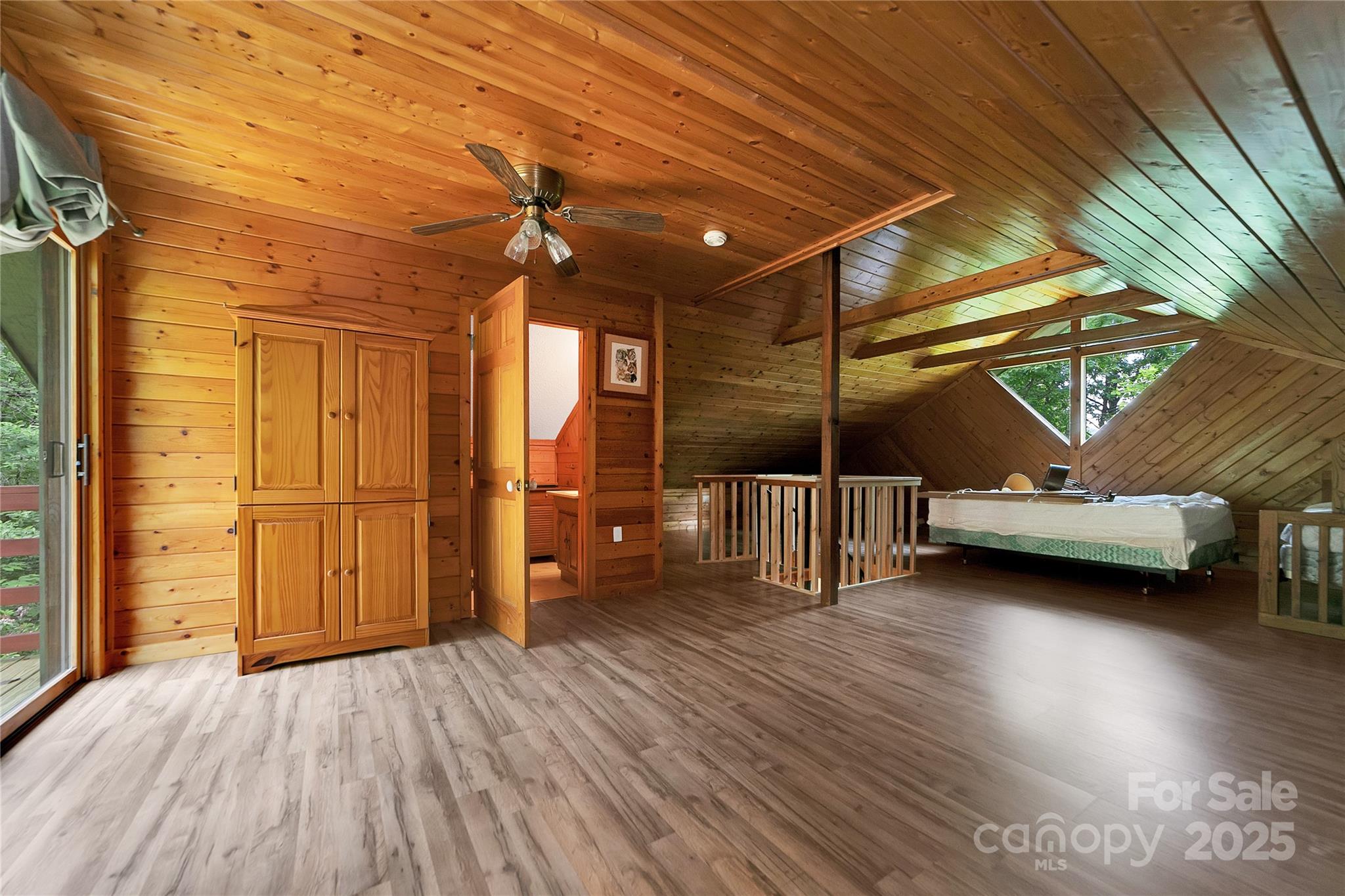 261 Franks Cove Road Brevard, NC 28712 - Photo 19 of 34 a view of empty room with wooden floor