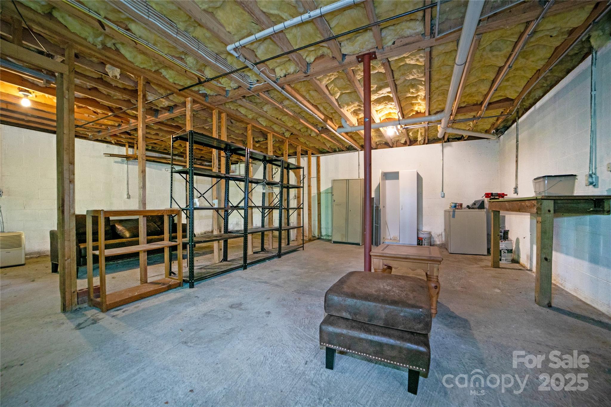 261 Franks Cove Road Brevard, NC 28712 - Photo 23 of 34 a view of a room with wooden walls