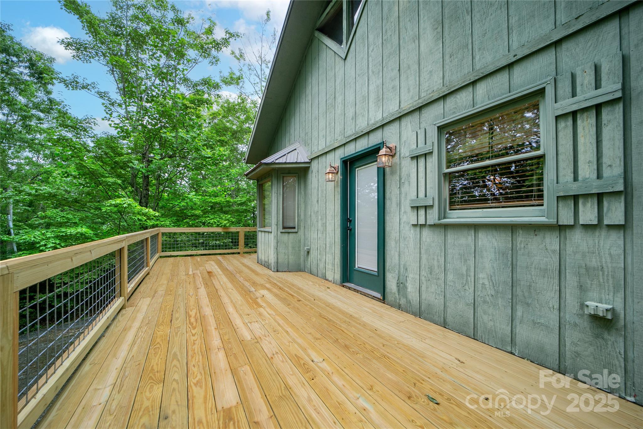 261 Franks Cove Road Brevard, NC 28712 - Photo 28 of 34 a view of balcony and wooden floor