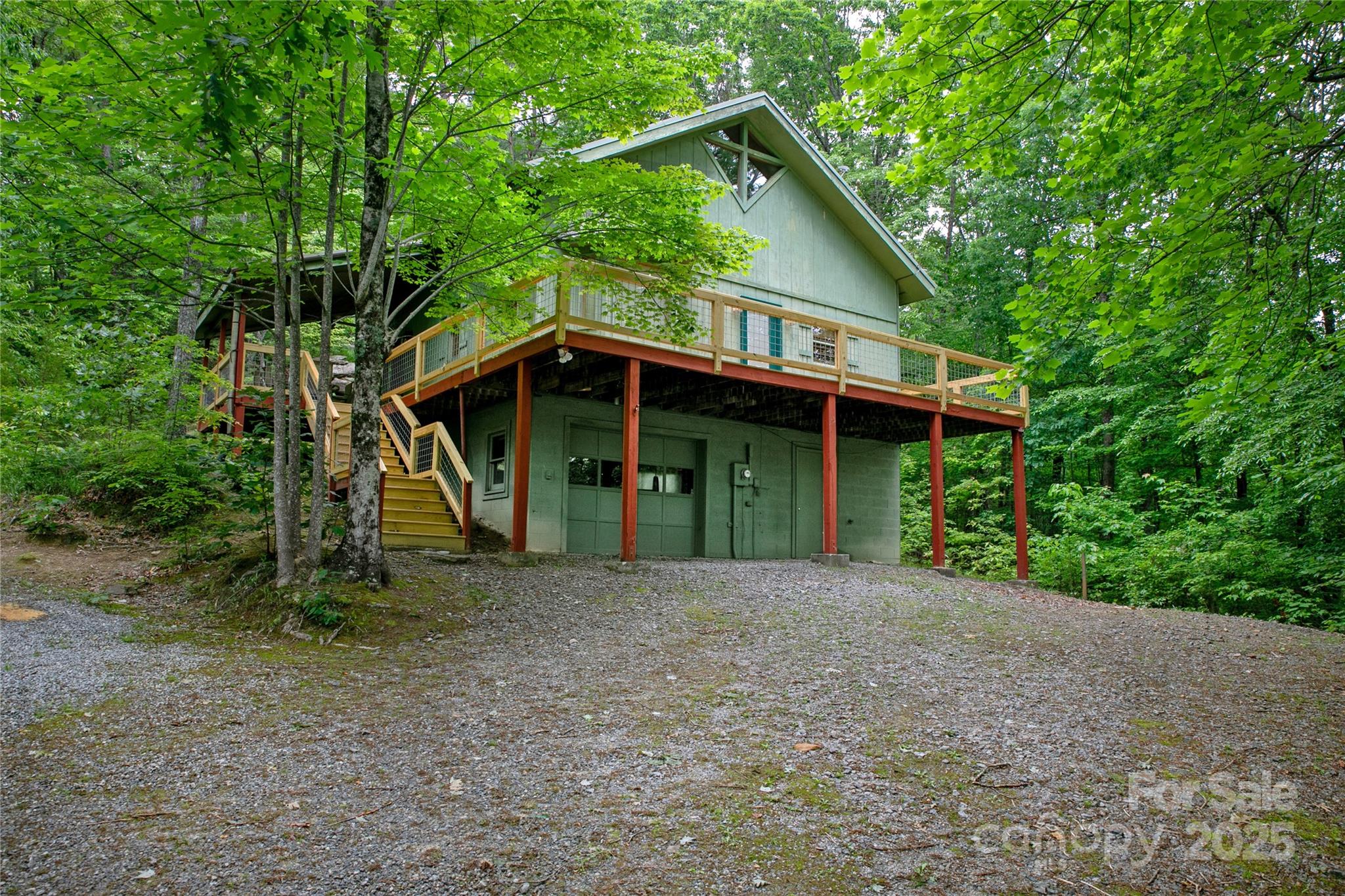 261 Franks Cove Road Brevard, NC 28712 - Photo 30 of 34 a view of a house with a yard