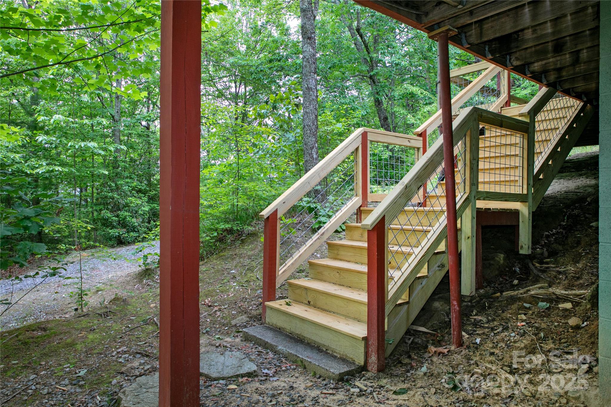 261 Franks Cove Road Brevard, NC 28712 - Photo 5 of 34 a view of outdoor space with deck and wooden fence