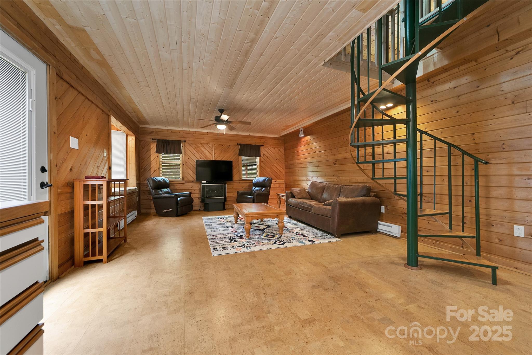 261 Franks Cove Road Brevard, NC 28712 - Photo 8 of 34 a lobby with furniture and a rug