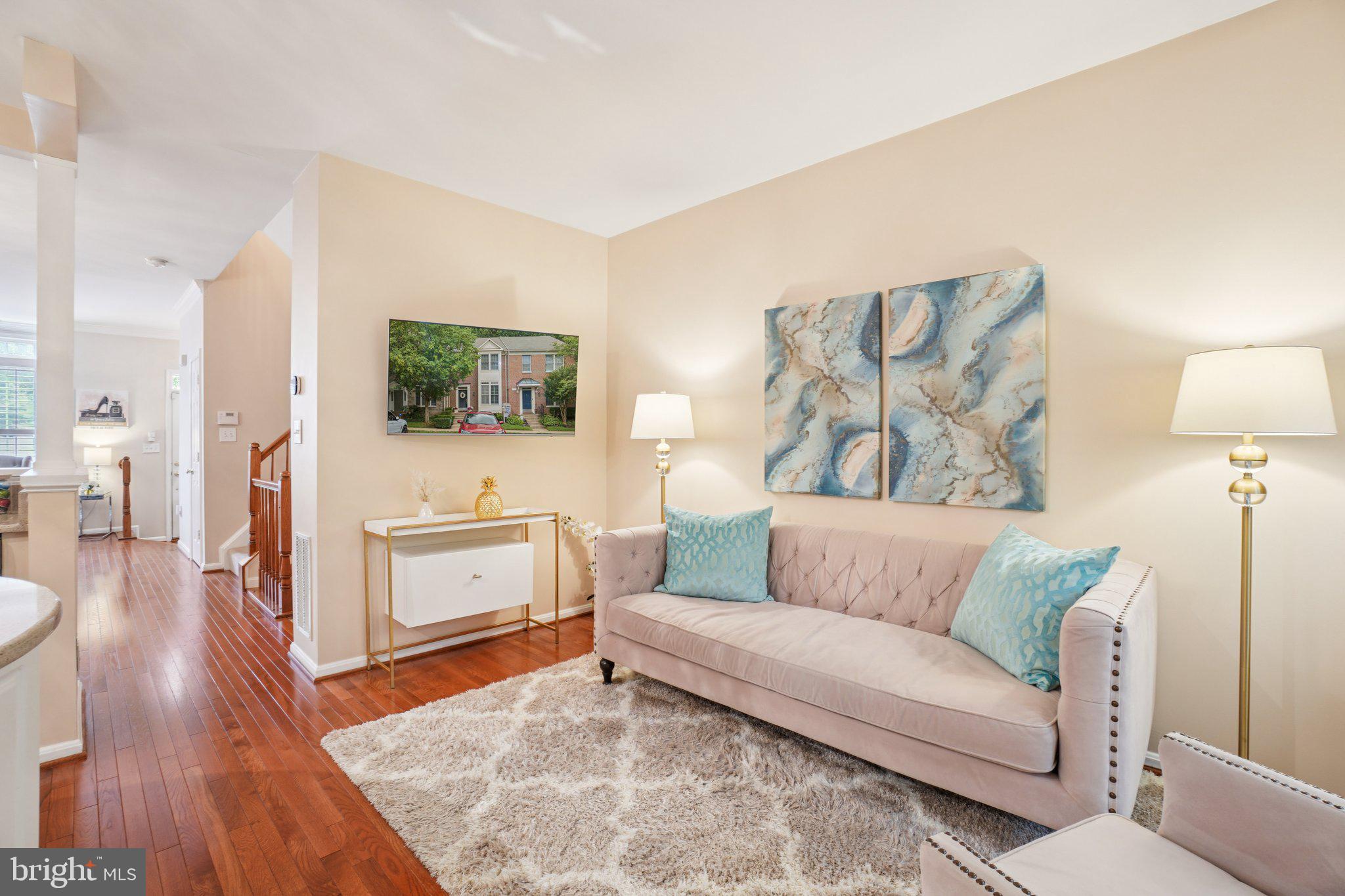11742 Valley Ridge Circle Fairfax, VA 22033 - Photo 11 of 34 a living room with furniture and wooden floor