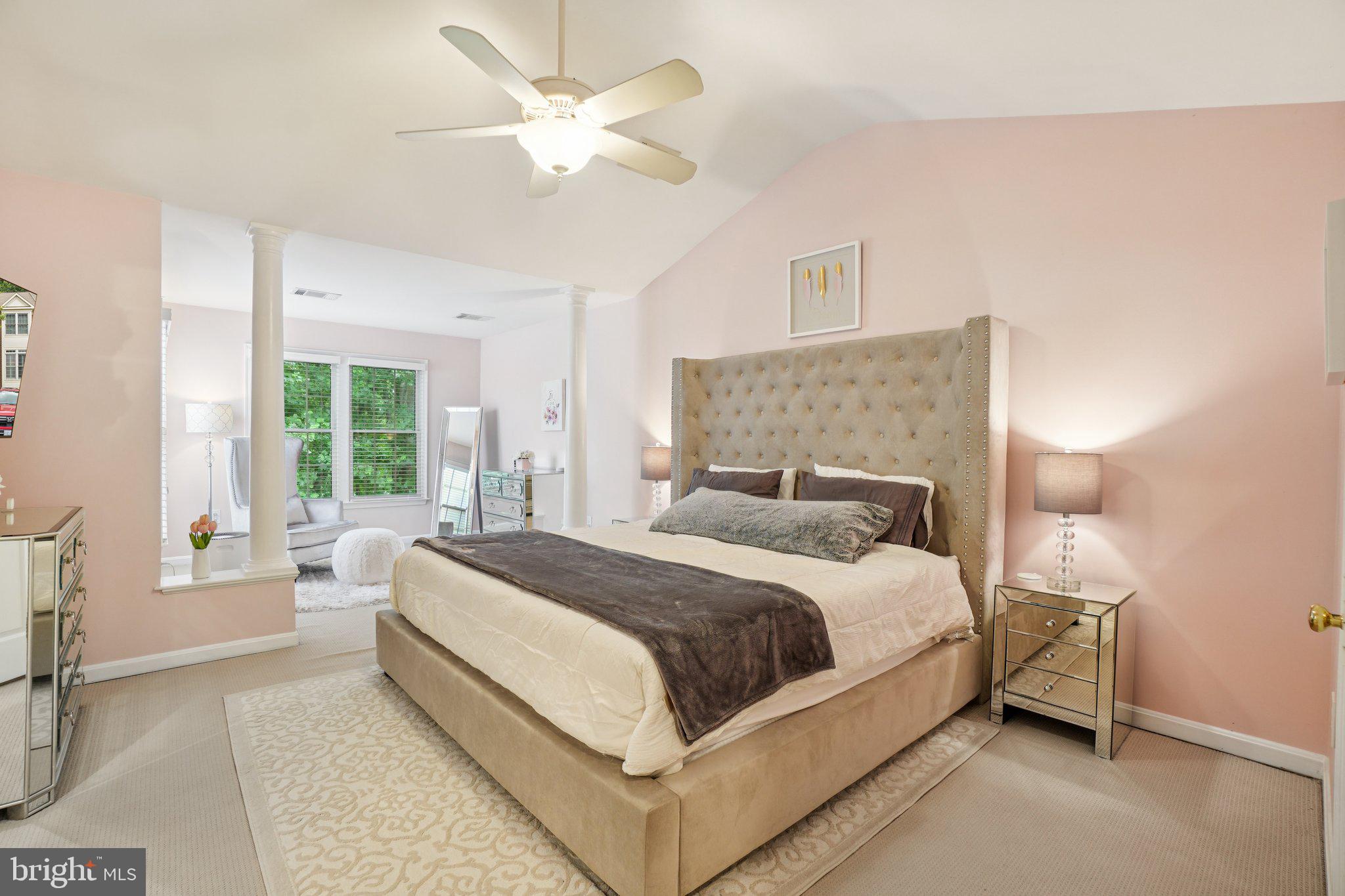 11742 Valley Ridge Circle Fairfax, VA 22033 - Photo 13 of 34 a bedroom with a large bed and a chandelier fan