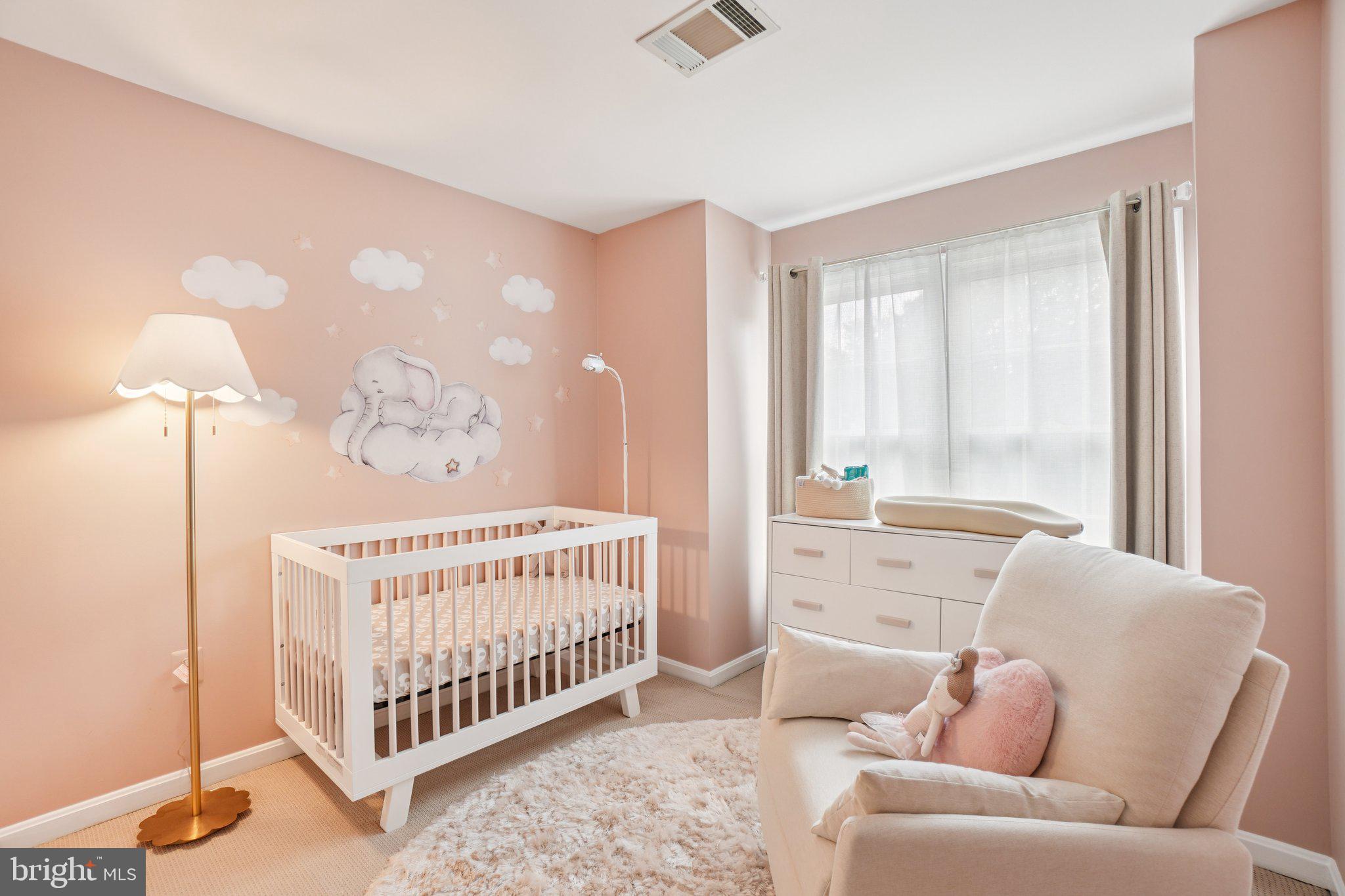 11742 Valley Ridge Circle Fairfax, VA 22033 - Photo 20 of 34 a bedroom with furniture and a large window