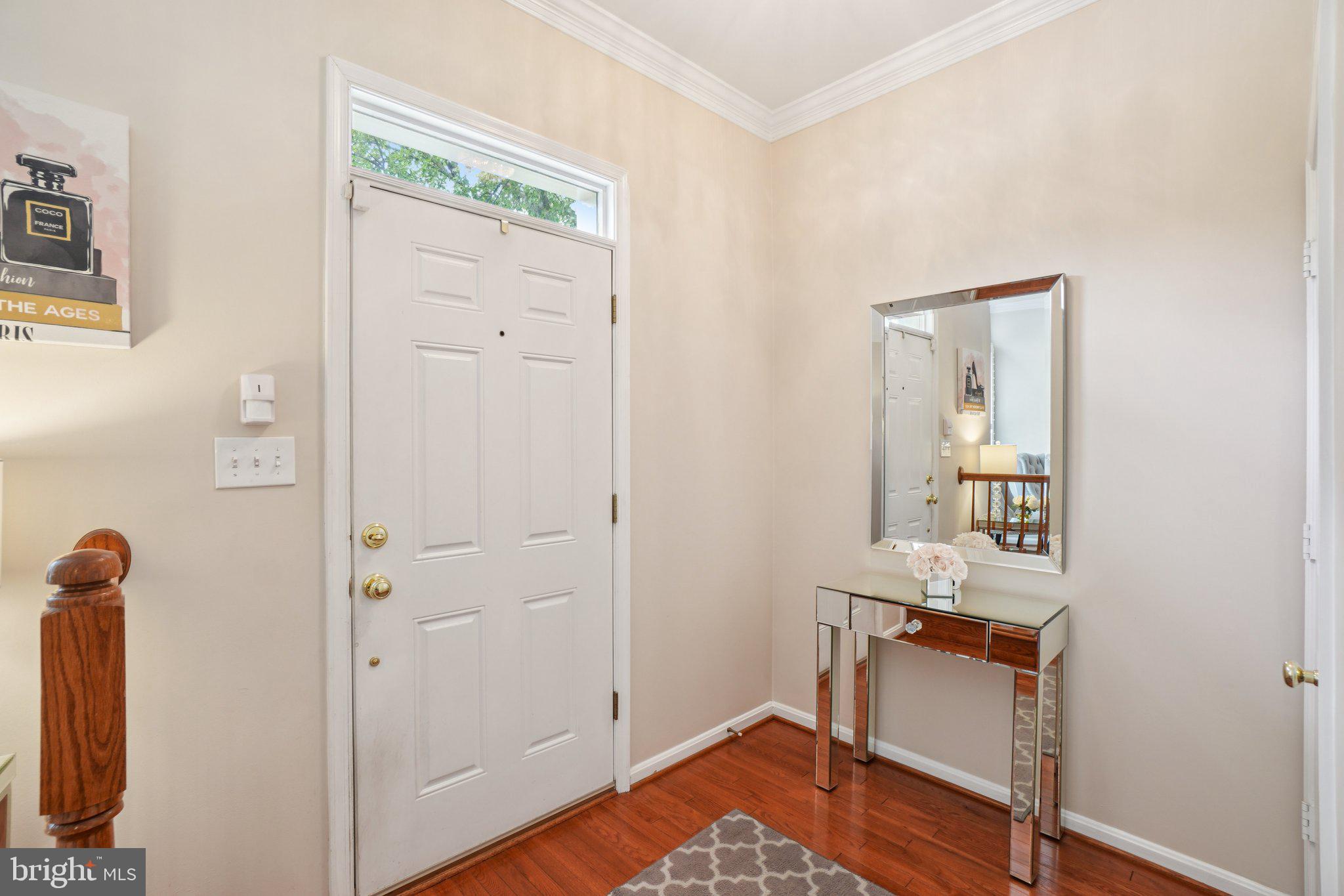 11742 Valley Ridge Circle Fairfax, VA 22033 - Photo 2 of 34 a view of room with furniture and wooden floor