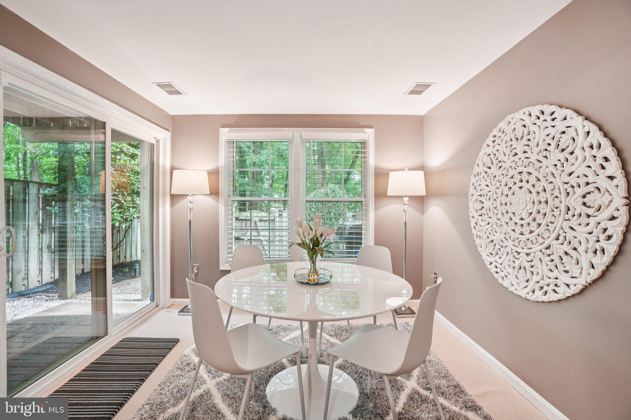 11742 Valley Ridge Circle Fairfax, VA 22033 - Photo 25 of 34 a dining room with furniture and window