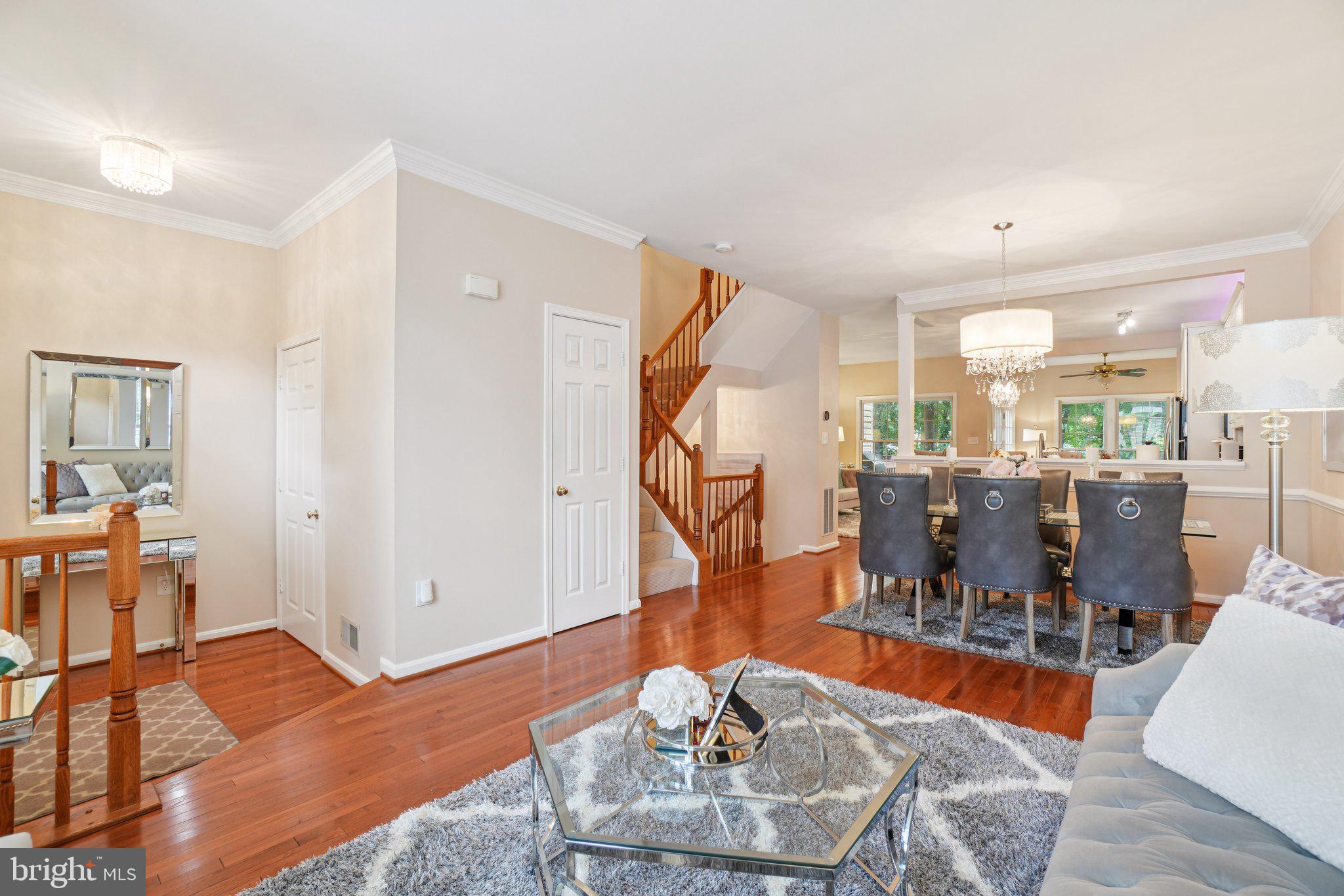11742 Valley Ridge Circle Fairfax, VA 22033 - Photo 3 of 34 a living room with furniture and a wooden floor