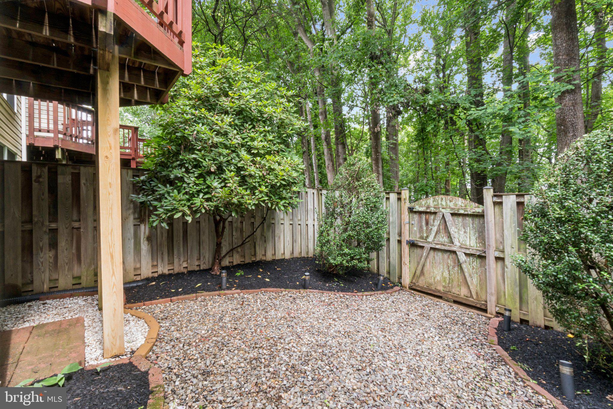 11742 Valley Ridge Circle Fairfax, VA 22033 - Photo 32 of 34 a backyard of a house with lots of green space