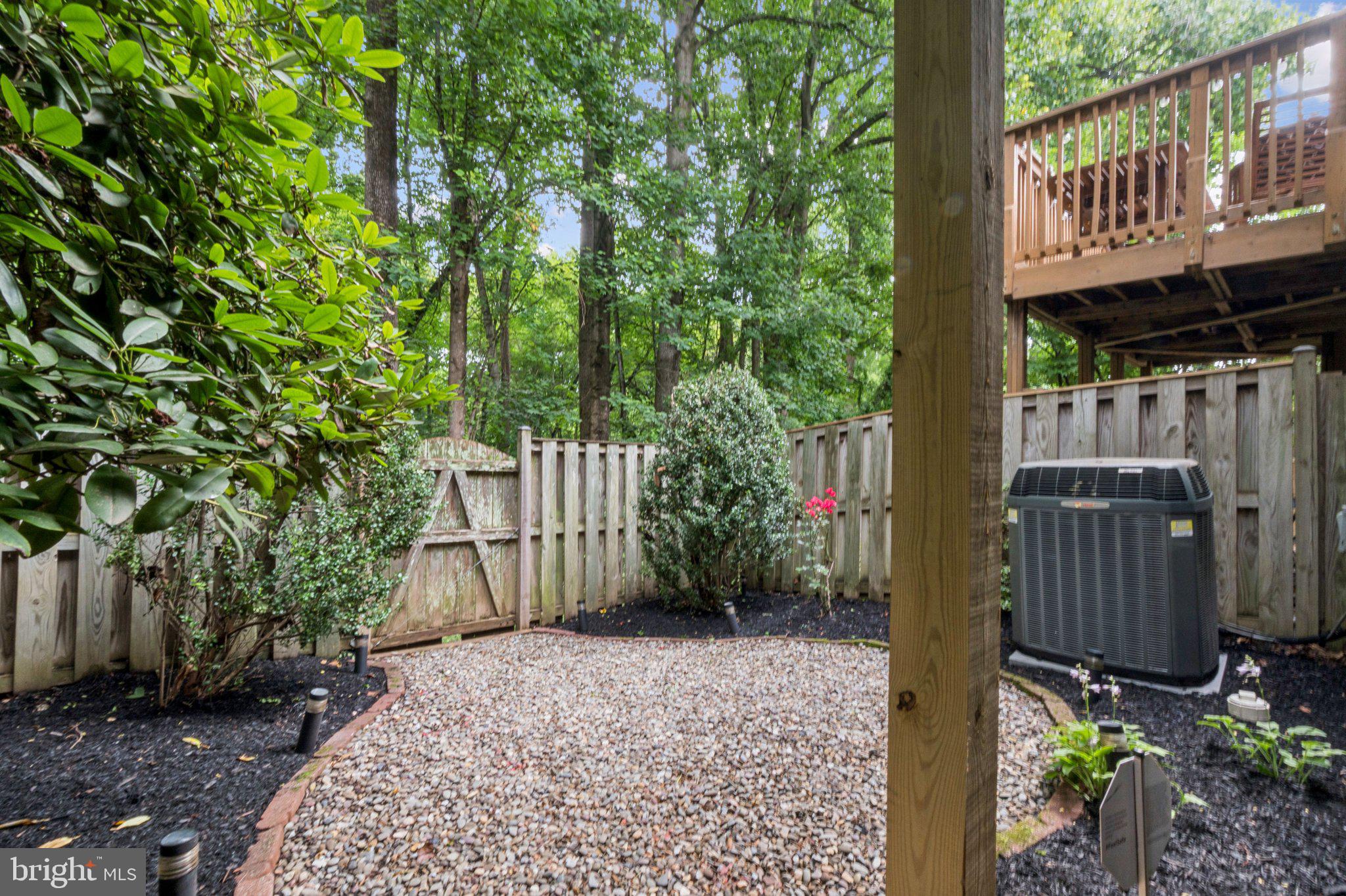 11742 Valley Ridge Circle Fairfax, VA 22033 - Photo 33 of 34 a view of a entrance with stairs and wooden fence