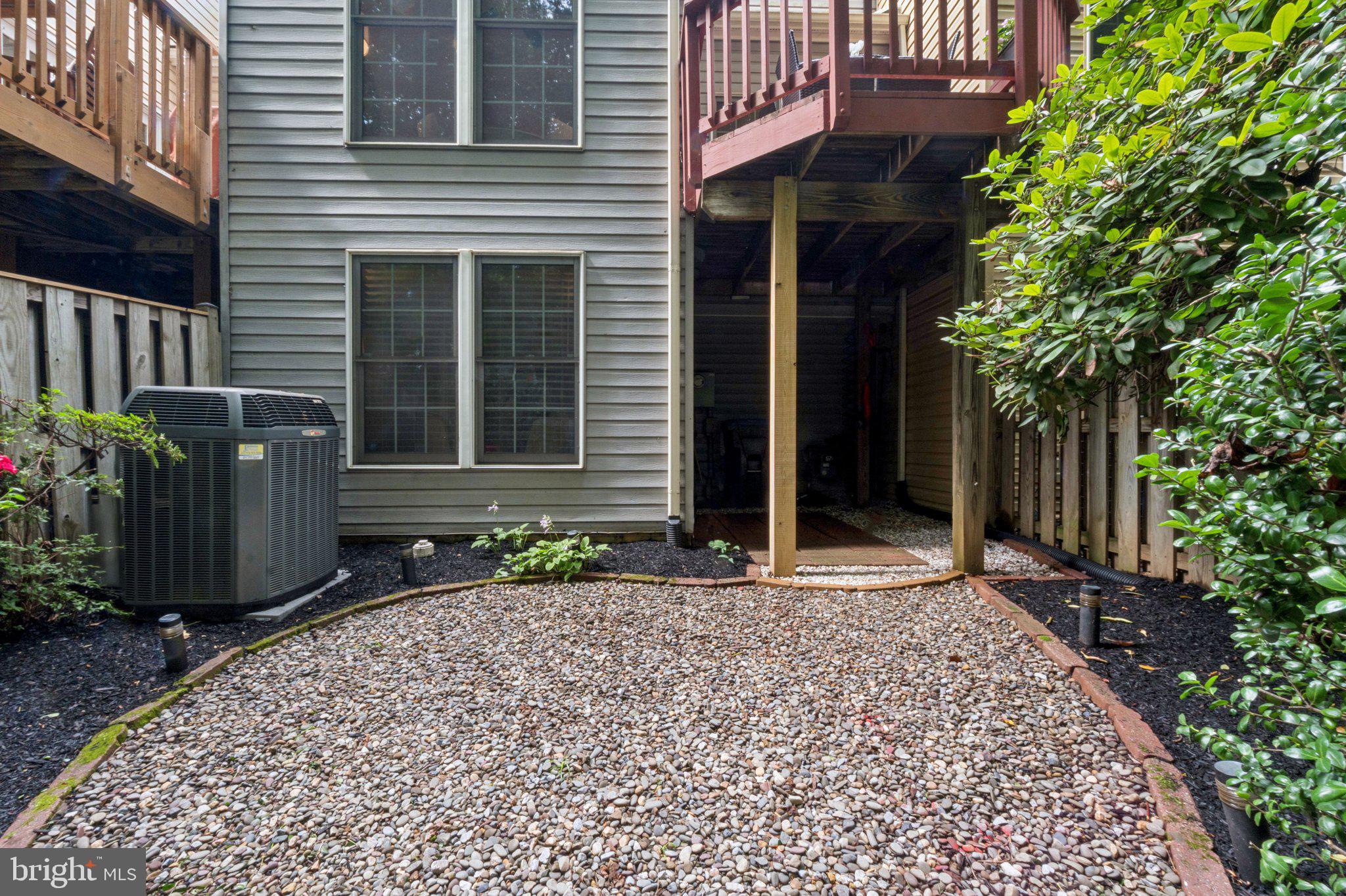 11742 Valley Ridge Circle Fairfax, VA 22033 - Photo 34 of 34 a view of a house with a yard