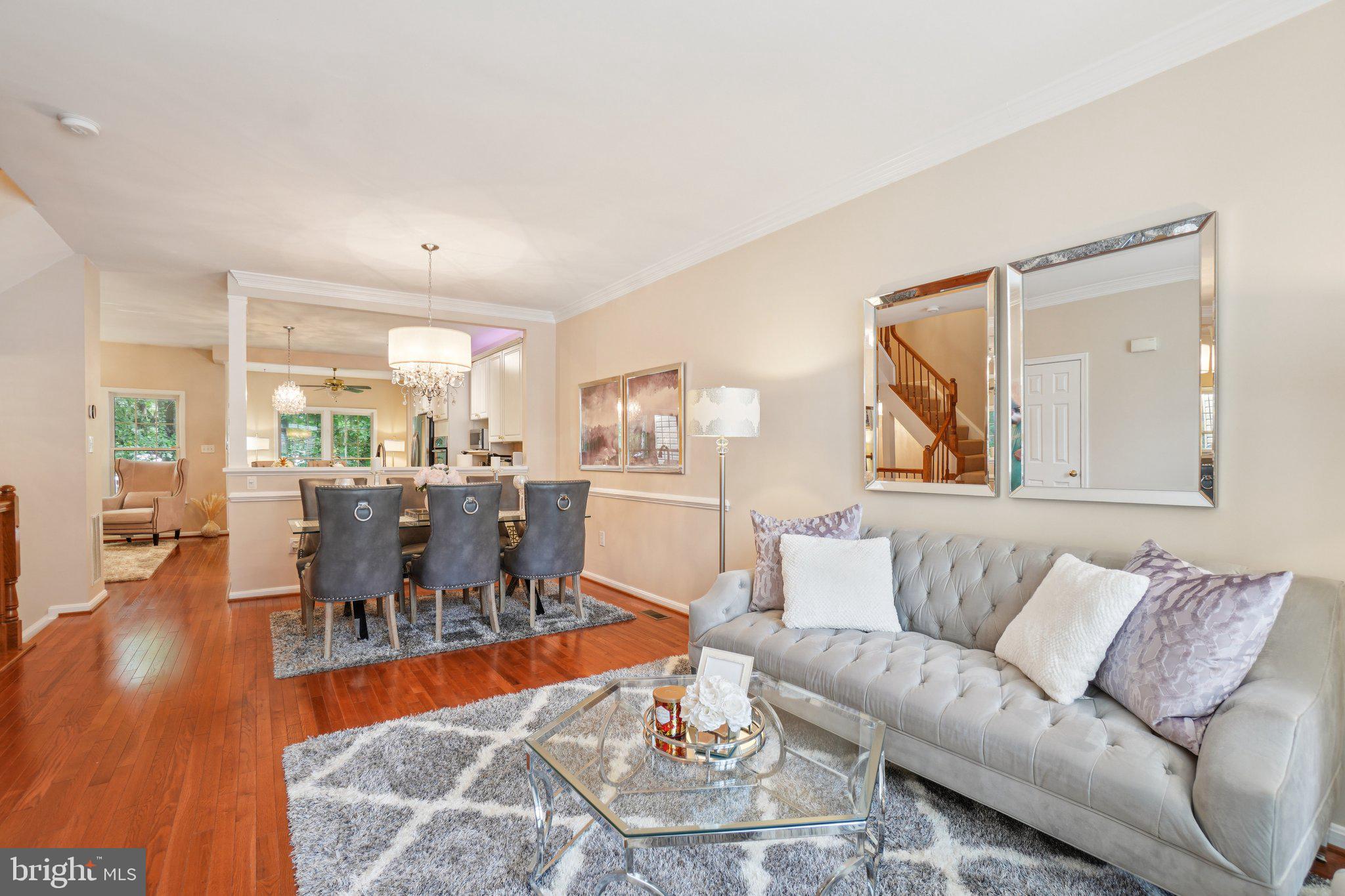 11742 Valley Ridge Circle Fairfax, VA 22033 - Photo 4 of 34 a living room with furniture and wooden floor