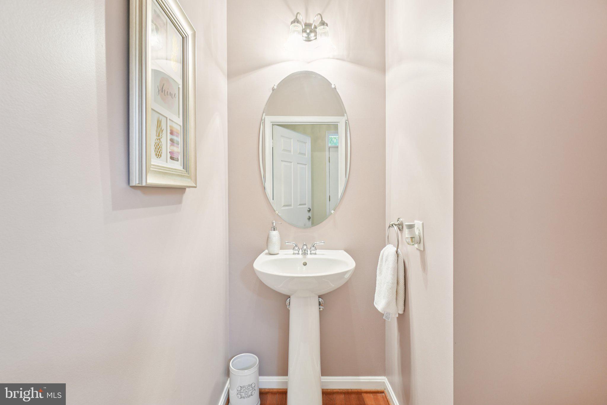 11742 Valley Ridge Circle Fairfax, VA 22033 - Photo 6 of 34 a bathroom with a sink and a mirror