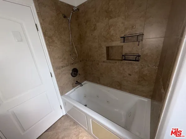 a bathroom with a bathtub
