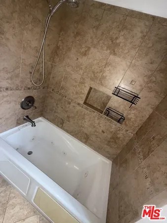 a bathroom with a bathtub