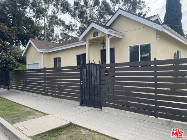 a view of house with a outdoor space