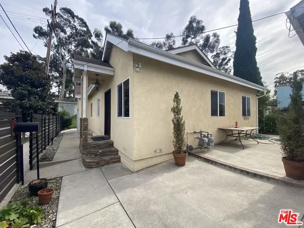 a view of a house with a patio