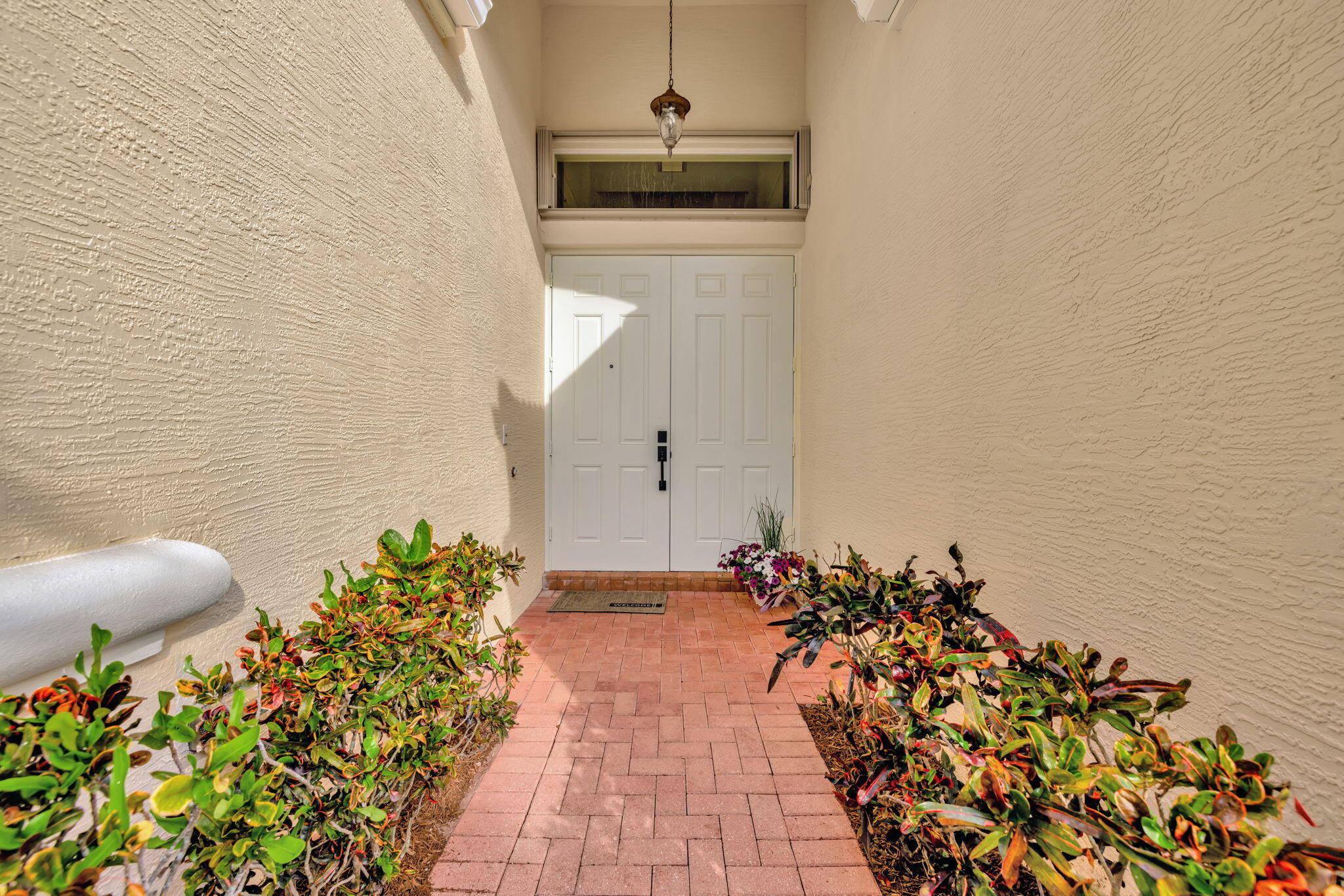 1476 Southeast Legacy Cove Circle Stuart, FL 34997 - Photo 4 of 43 front entrance